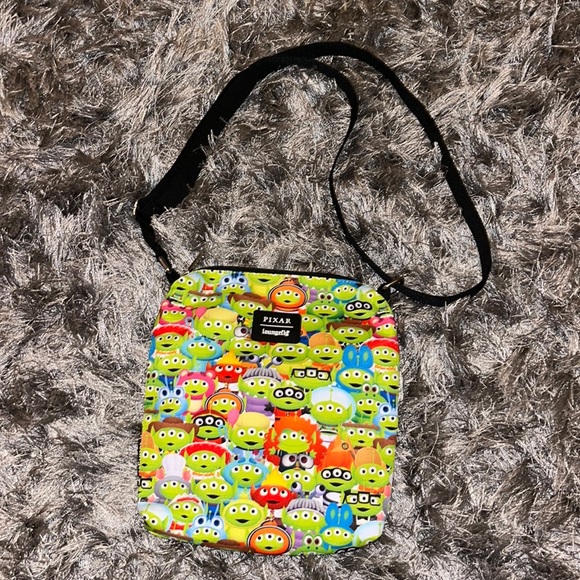 NWT Loungefly Toy Story Alien Outfits AOP Passport Bag - Picture 2 of 5